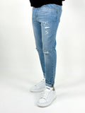 Jeans con rotture e schizzi - Over-D